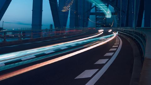 Road traffic across a bridge