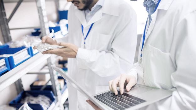 DSV employees are testing the products’ quality and record it on a computer