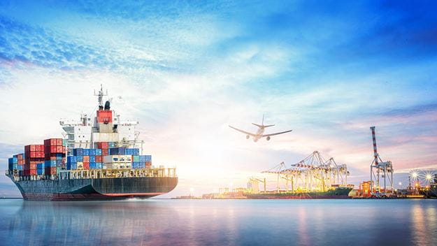 Cargo ship and cargo plane at port