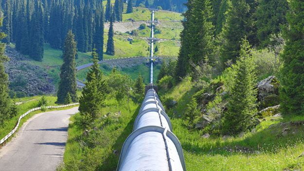 A pipeline going through a field