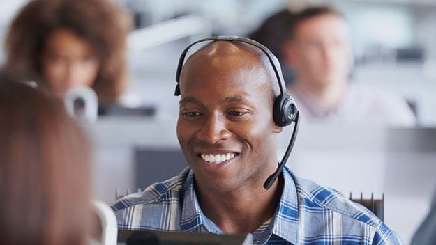 Male customer service employee with headset
