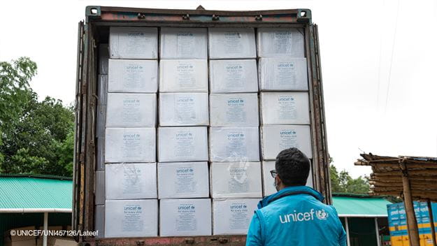 A person with UNICEF jacket