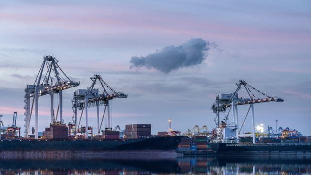 Containerships in the ocean at the harbor